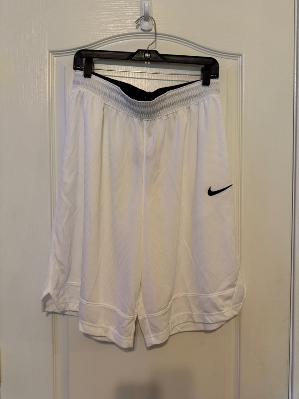 Nike White Basketball Shorts with Black Swoosh Accent